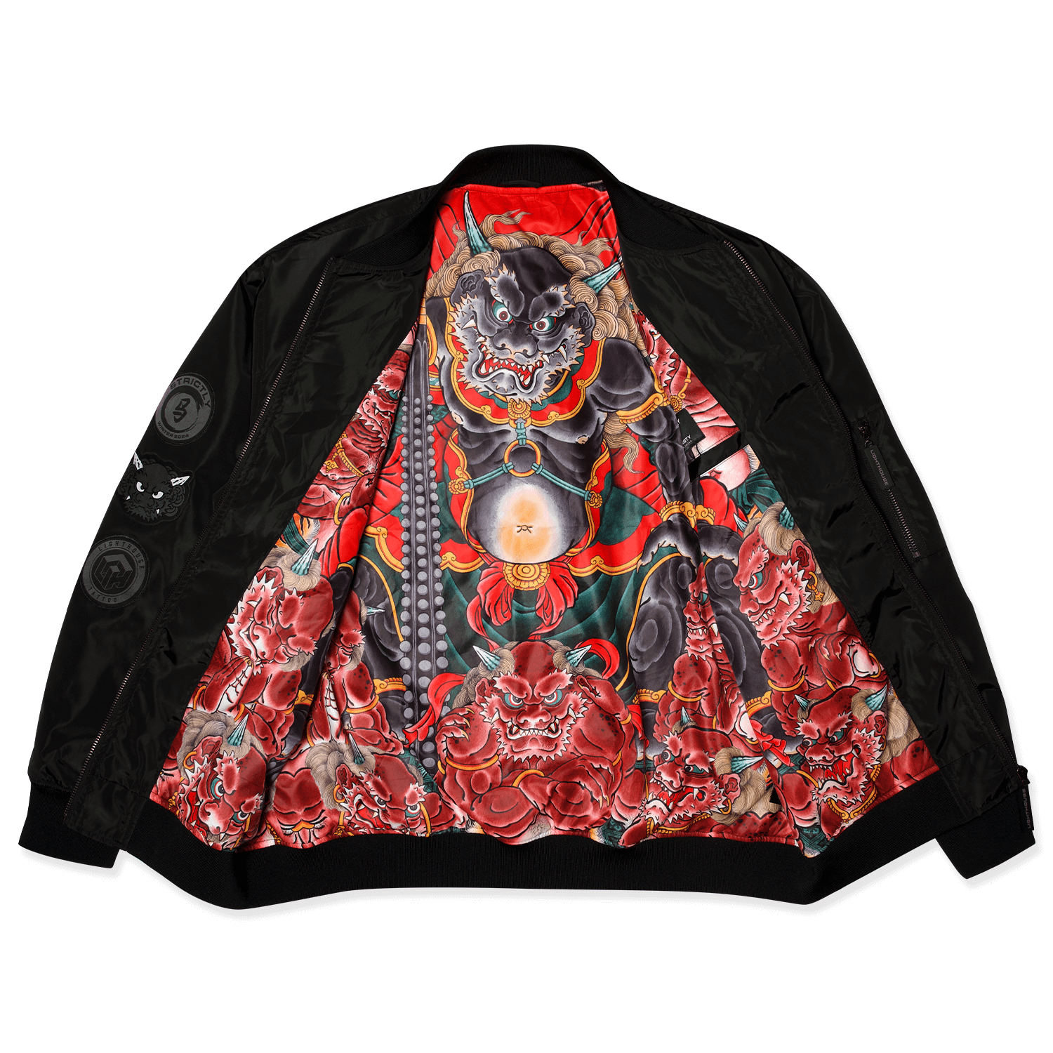 Shuten Doji Bomber jacket with black nylon outer, embroidered patches on sleeves, and vibrant full inner print featuring Shuten Doji design